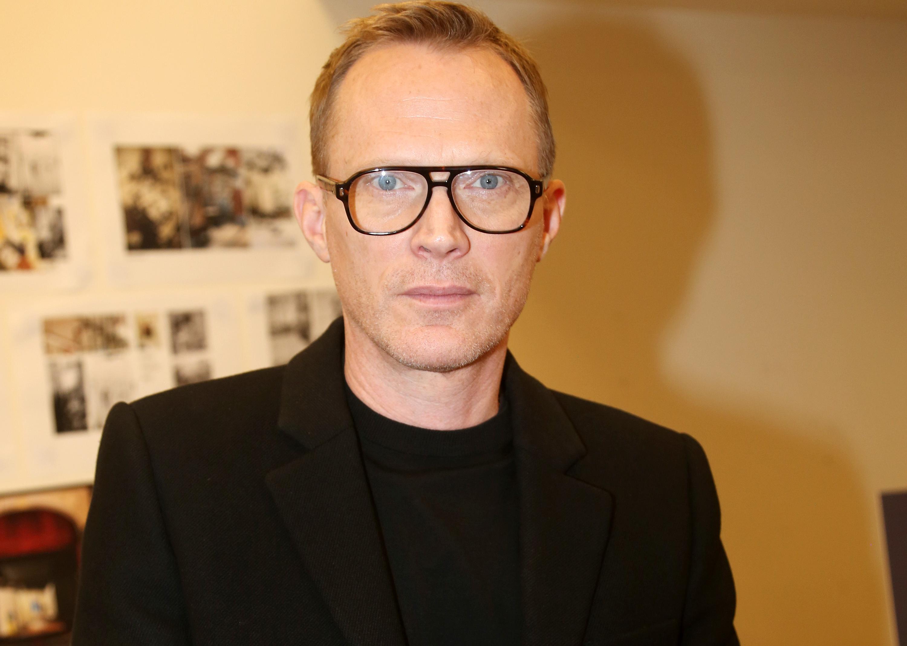 Paul Bettany in black.