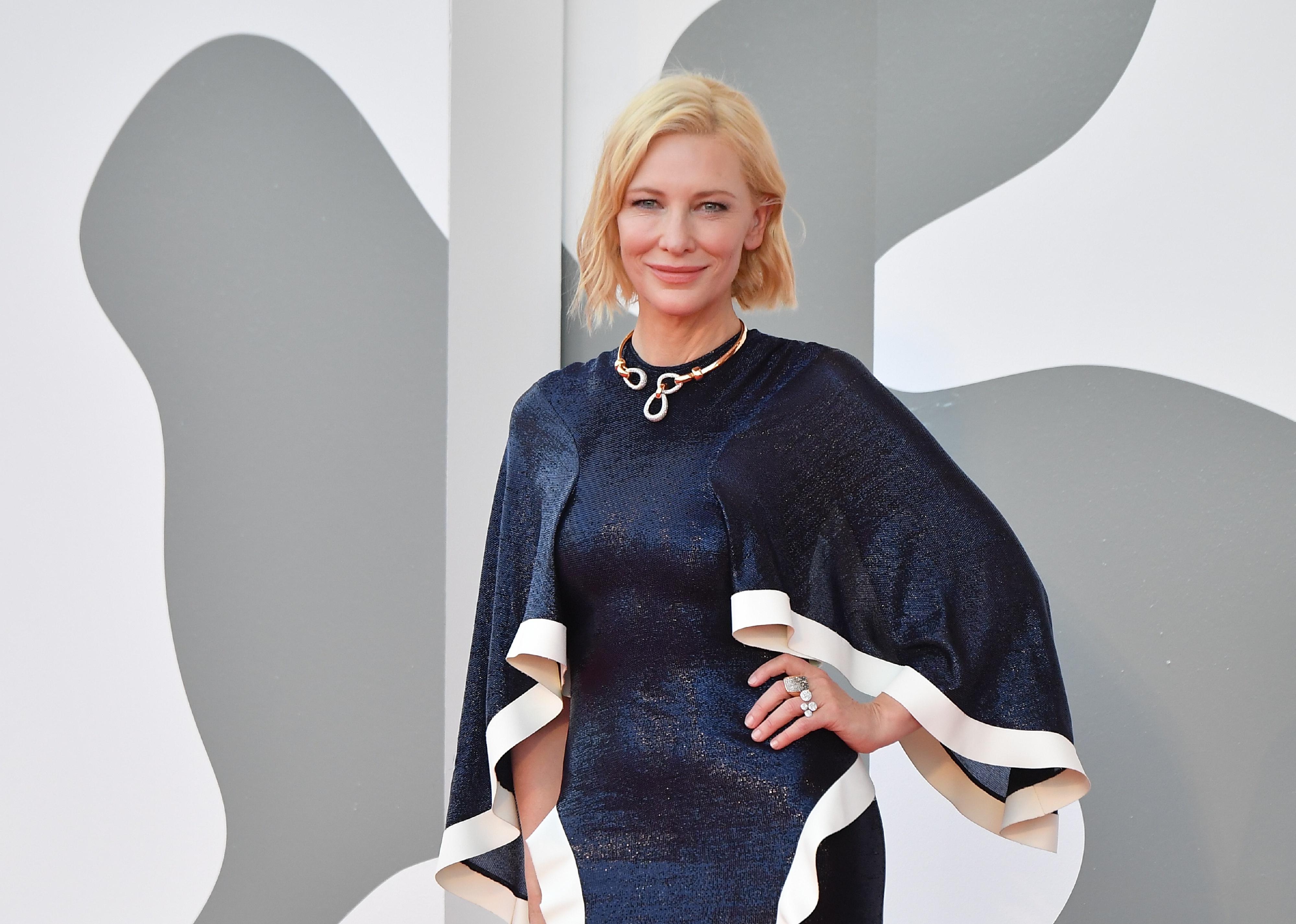 Cate Blanchett in a sparkling blue caped gown.