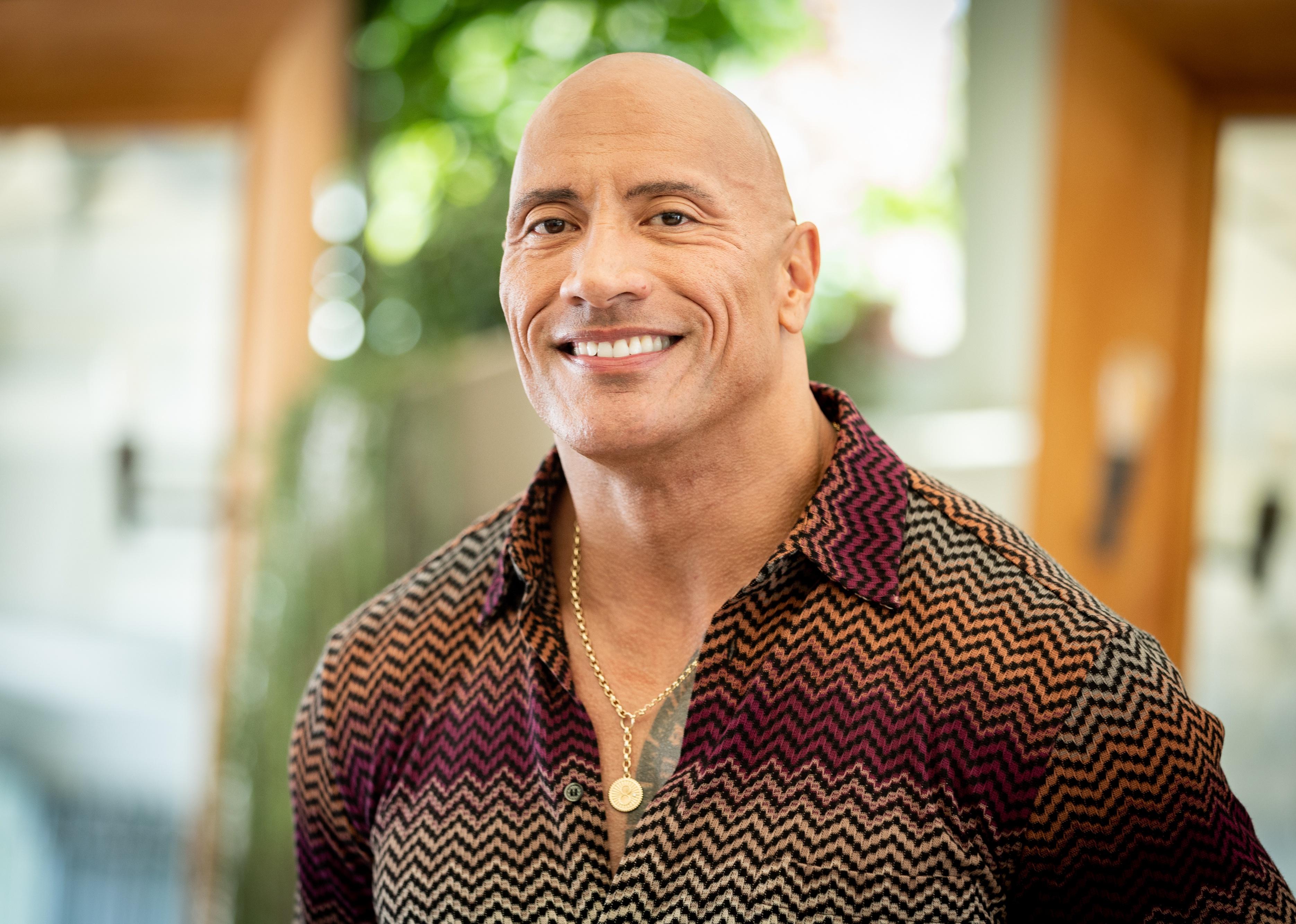 Dwayne Johnson in a zigzag pattern shirt.