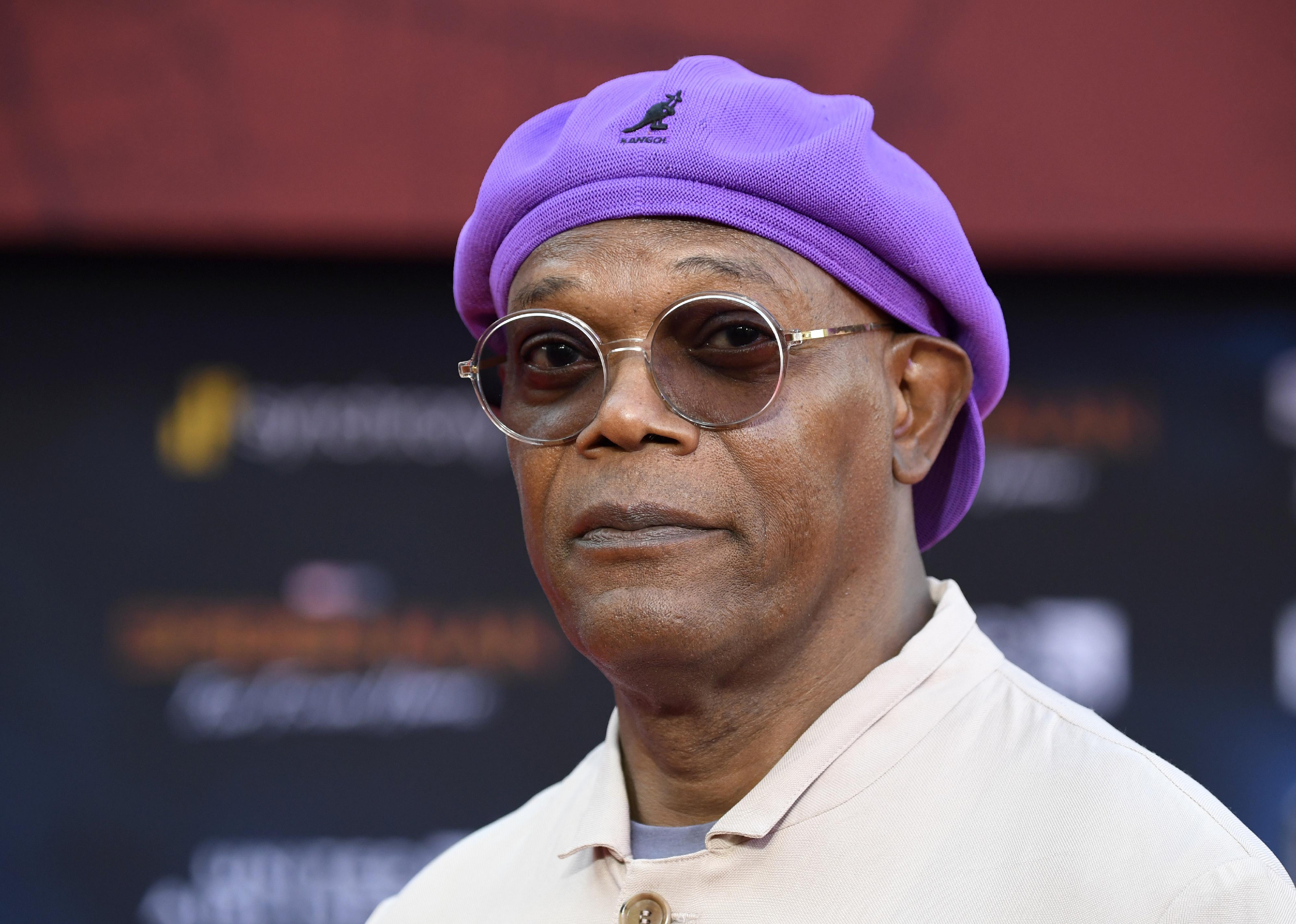 Samuel L. Jackon in a purple hat.