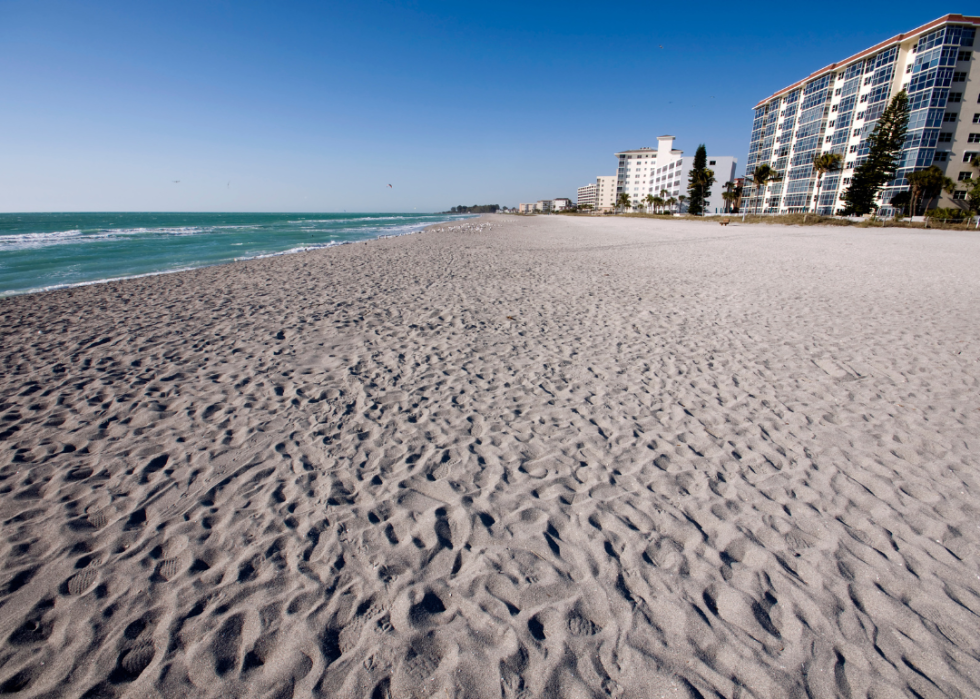 White sandy beach and condos.