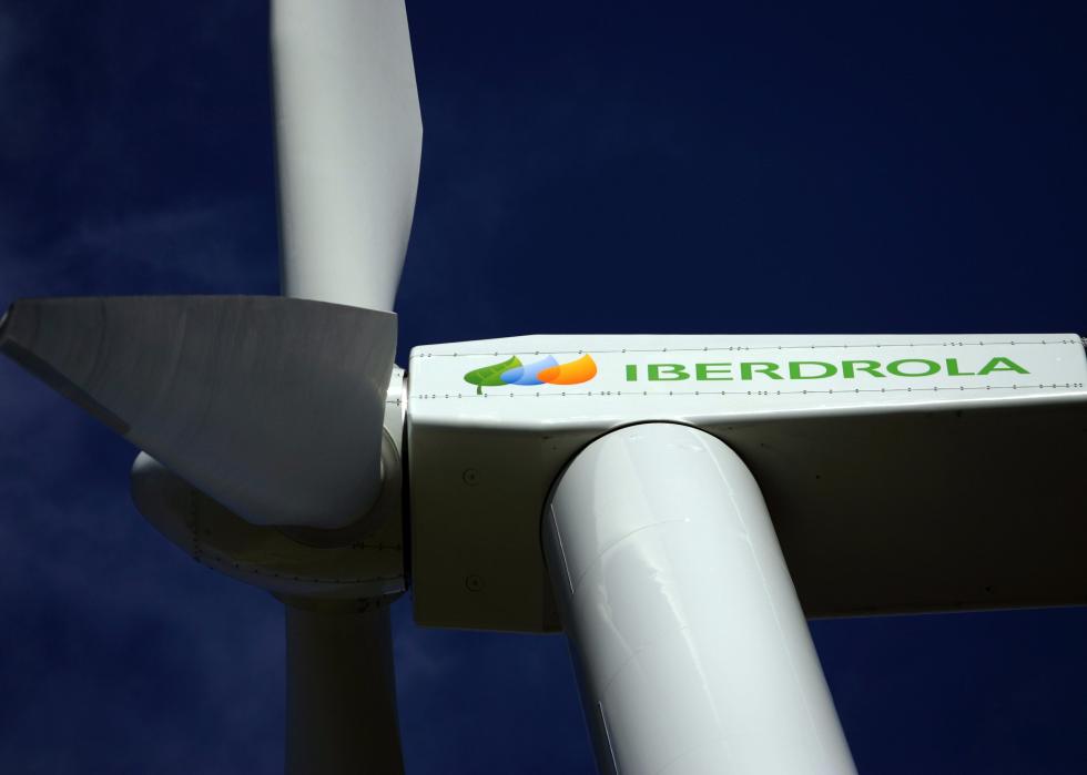 A close-up of an electricity generating wind turbine.