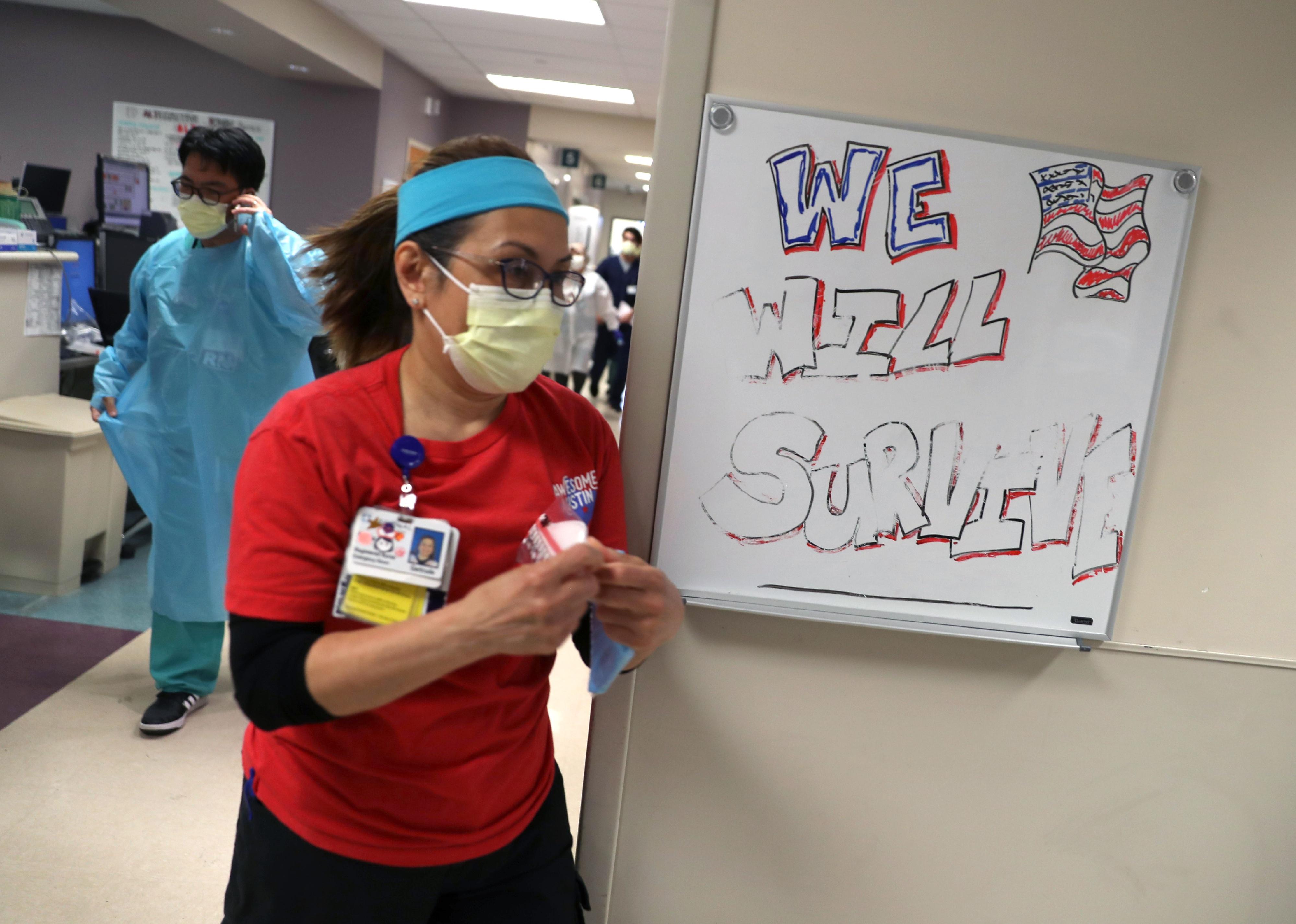 Nurses work quickly in a busy hospital.