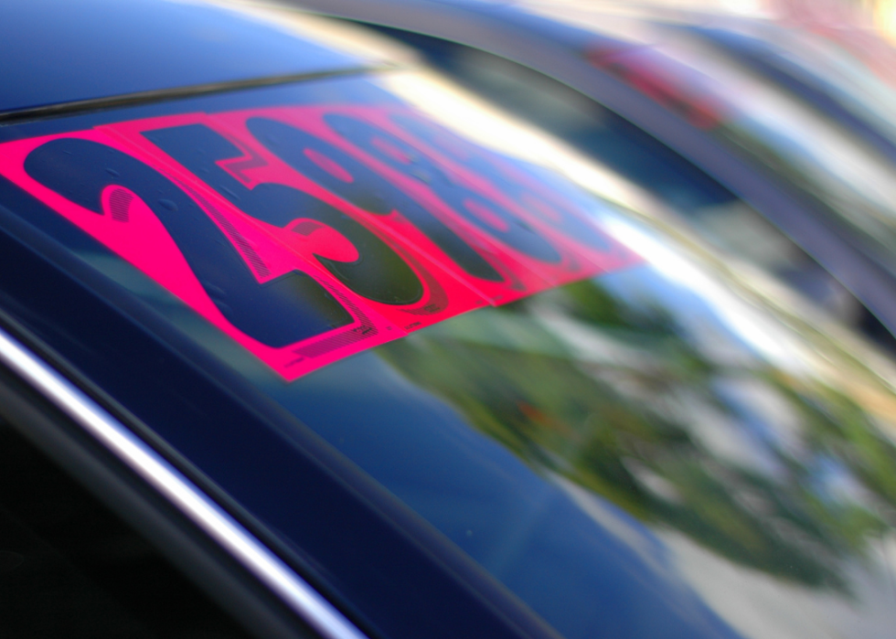 Price sticker on a used car.