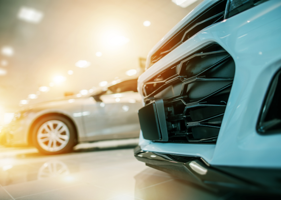 Close-up of car grill in used cars showroom.