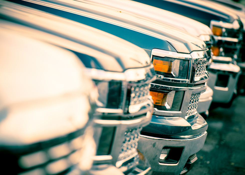 Close-up of a row of truck grills.