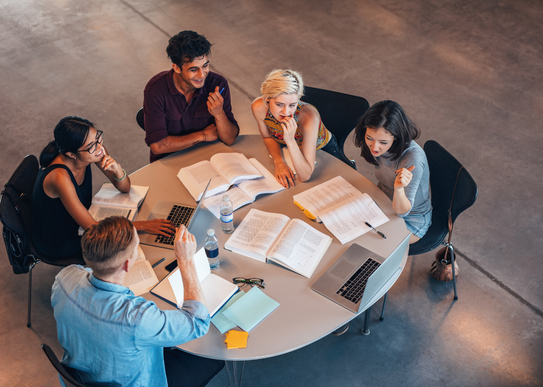 Students sitting at a round table studying