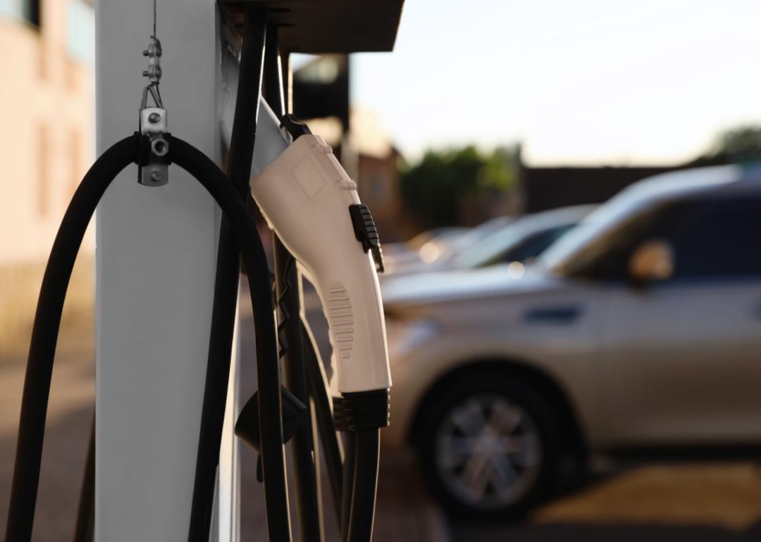 A white electric vehicle charging station.