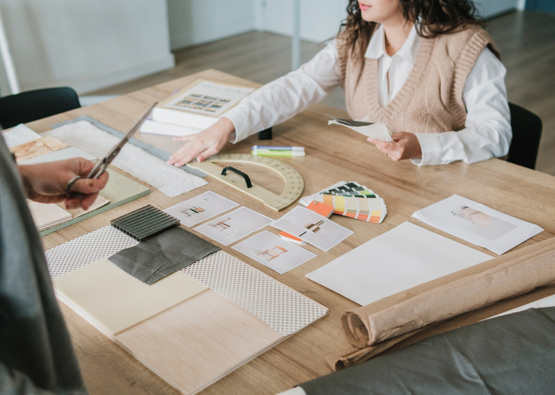 Interior designer working on a vision board for a room.