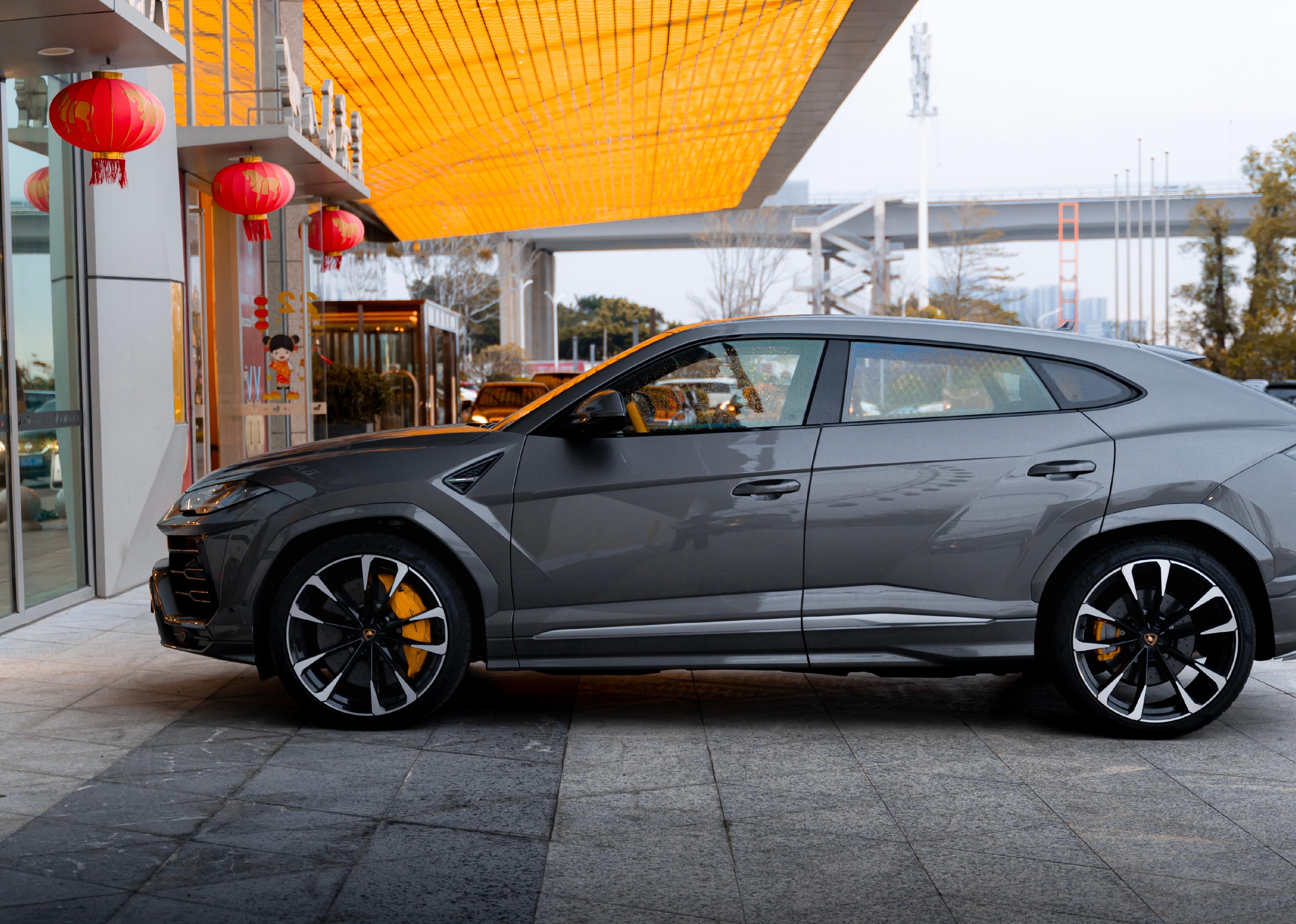 A grey Lamborghini Urus.