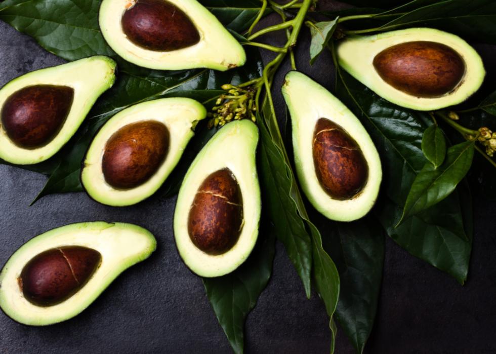 Avocados cut open.