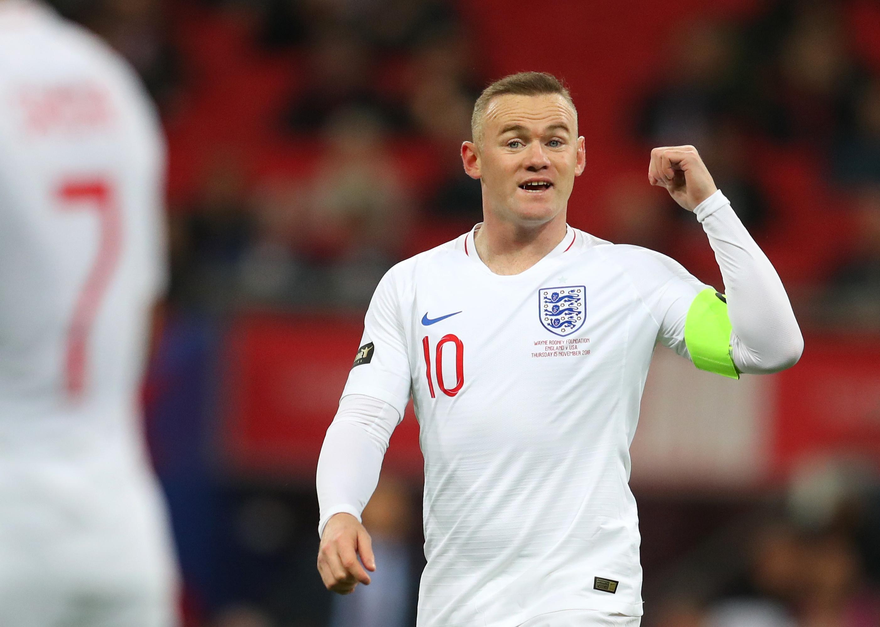 Wayne Rooney on the field at Wembley Stadium