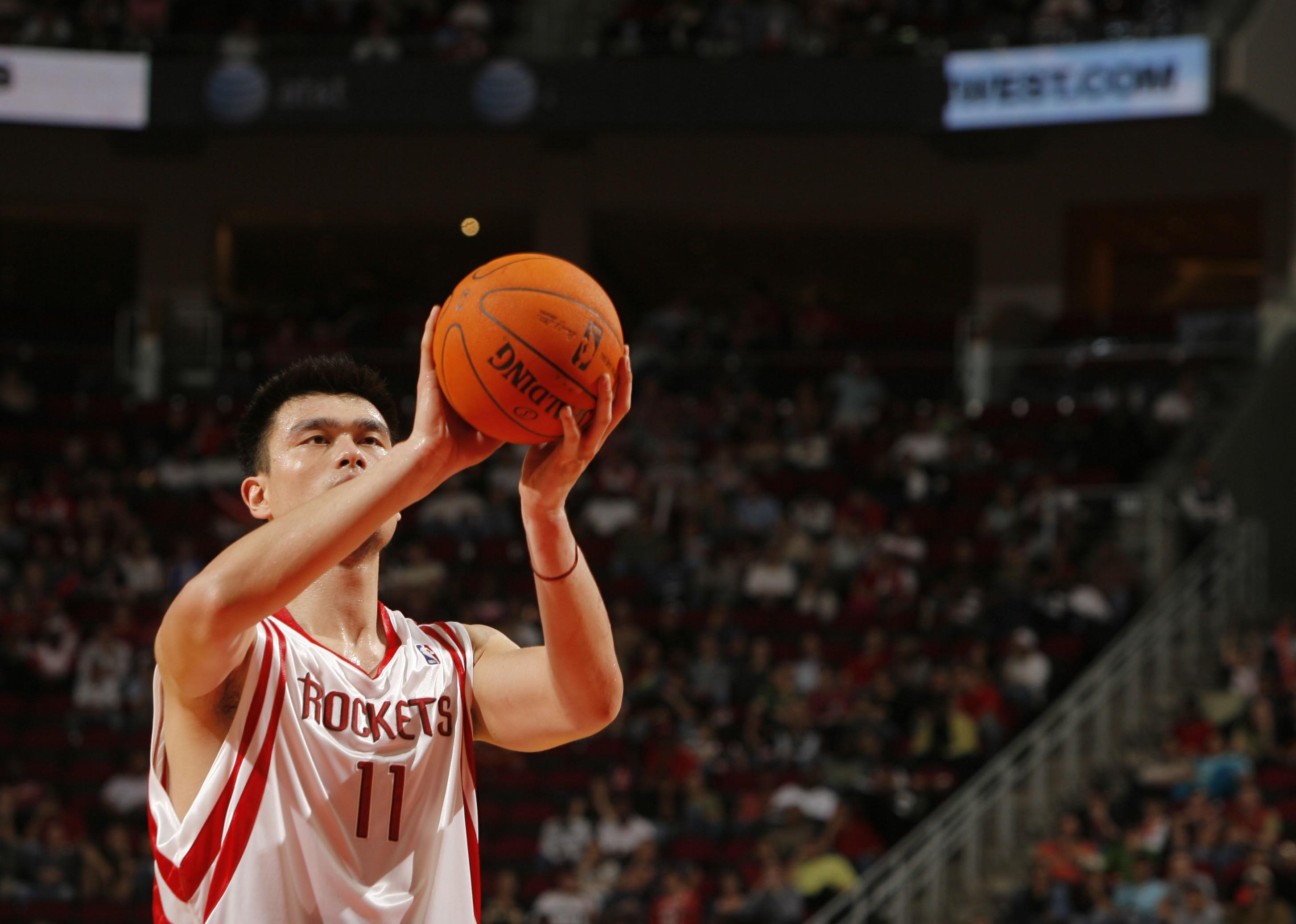 Yao Ming shoots the basketball during a game.