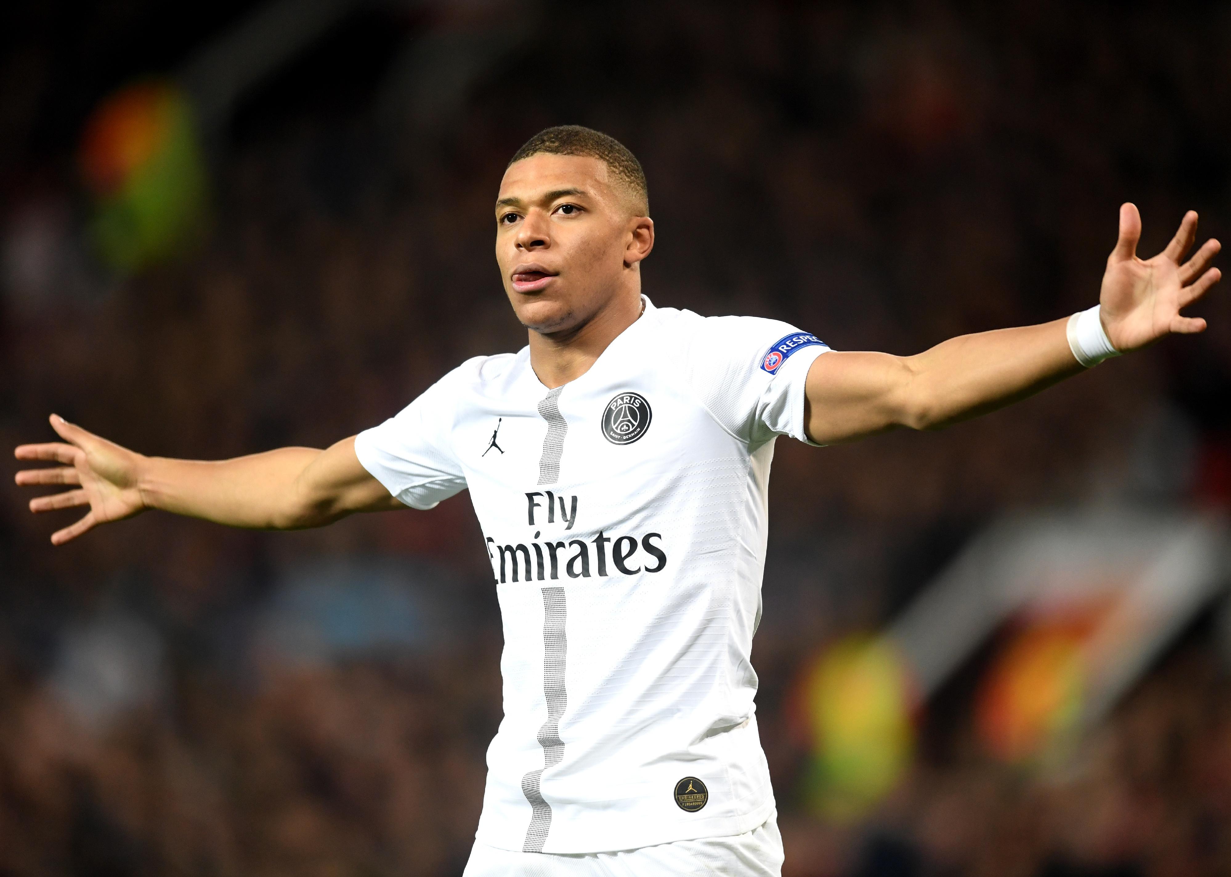Kylian Mbappe celebrates after scoring a goal