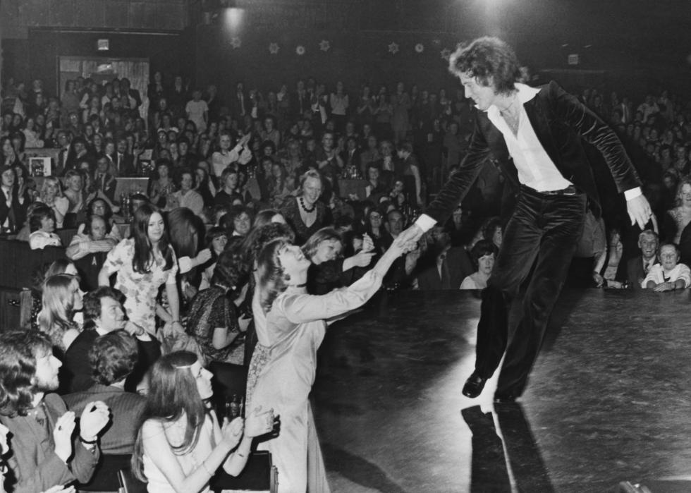 Gilbert O'Sullivan on stage.