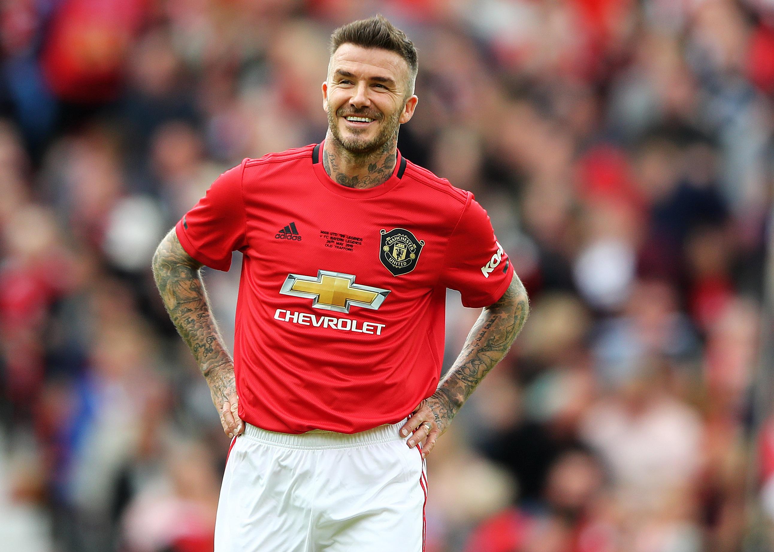 David Beckham of Manchester United '99 Legends looks on during a game