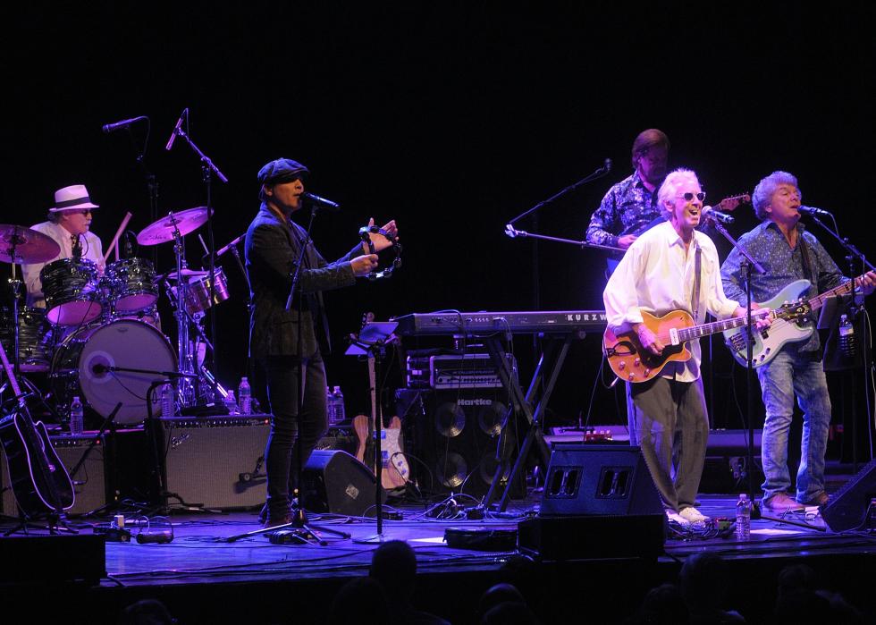 Elliot Lurie and Jeff Grob of Looking Glass perform on stage in 2019.