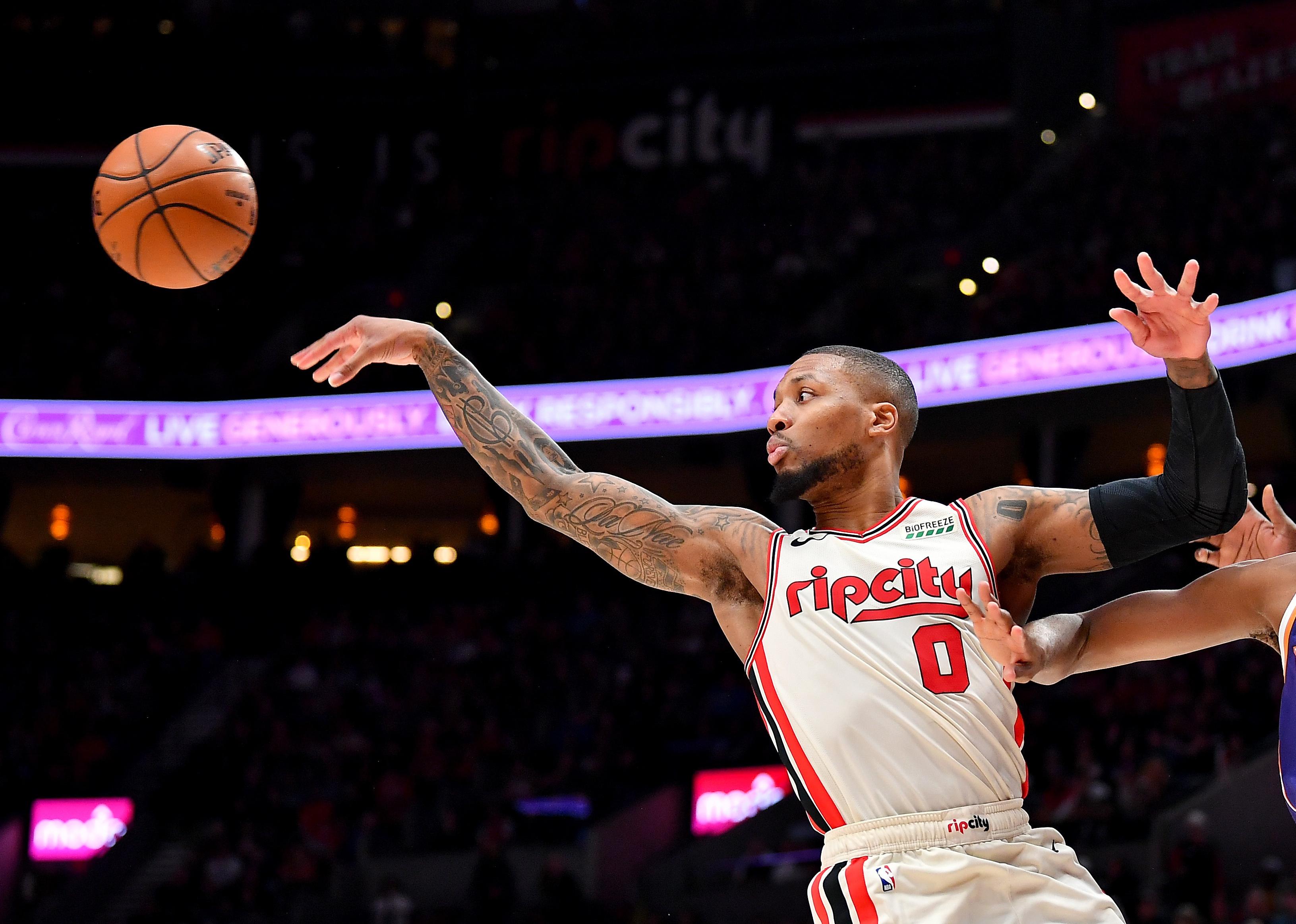 Damian Lillard #0 of the Portland Trail Blazers passes the ball.