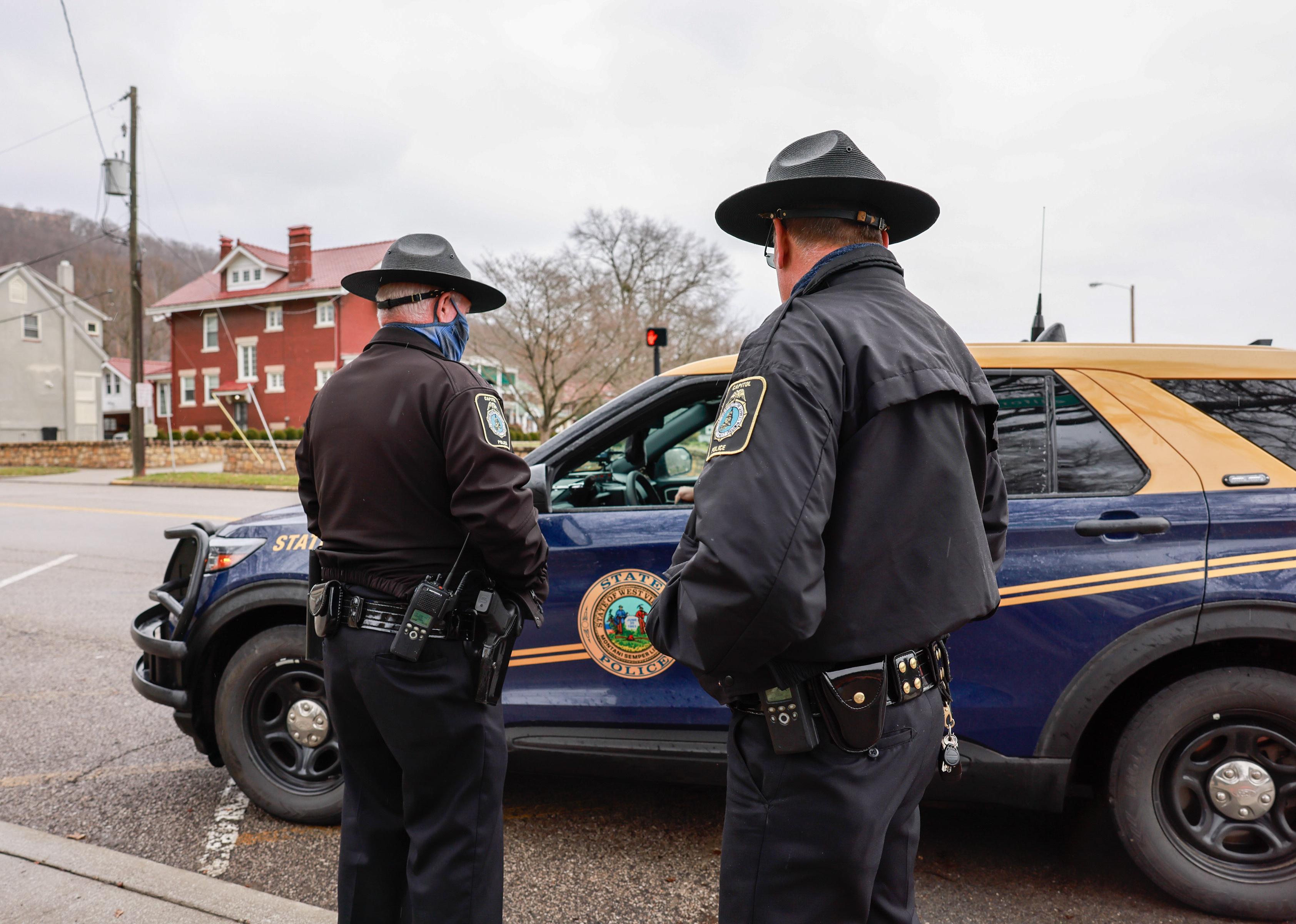 West Virginia state police and a car.