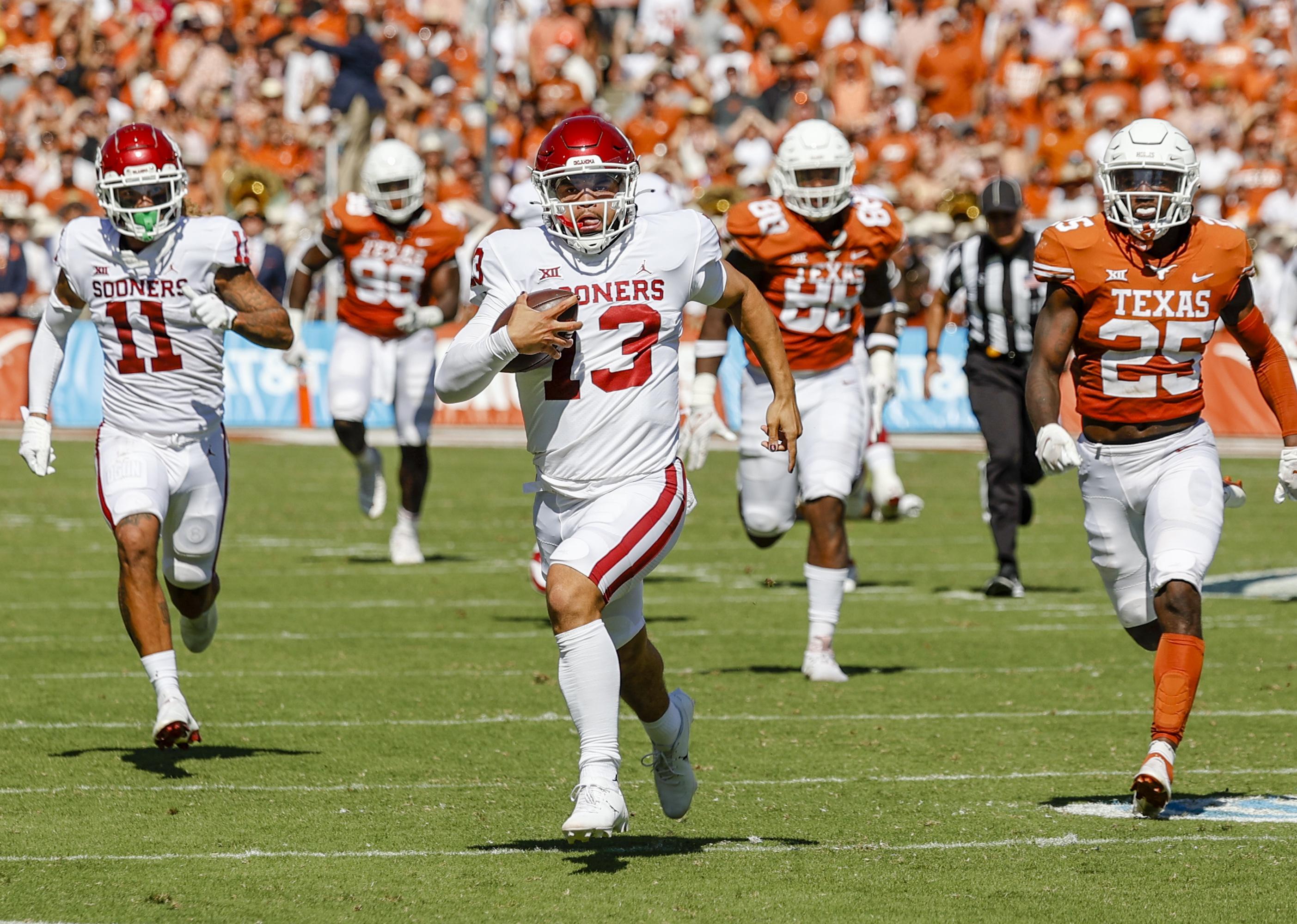 Oklahoma Sooners quarterback Caleb Williams runs for a touchdown.