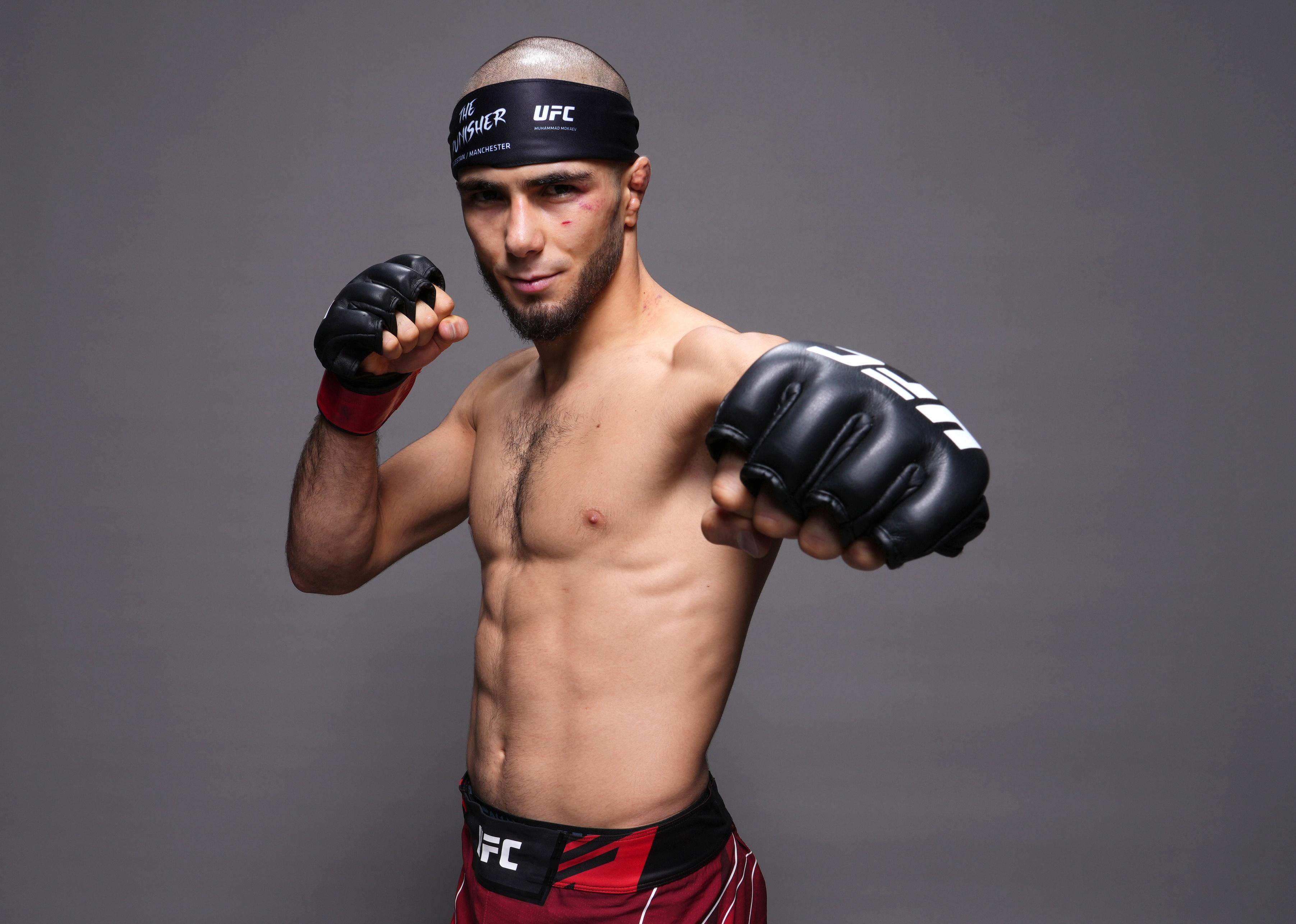 Muhammad Mokaev poses for a portrait after his victory during the UFC 280 event.