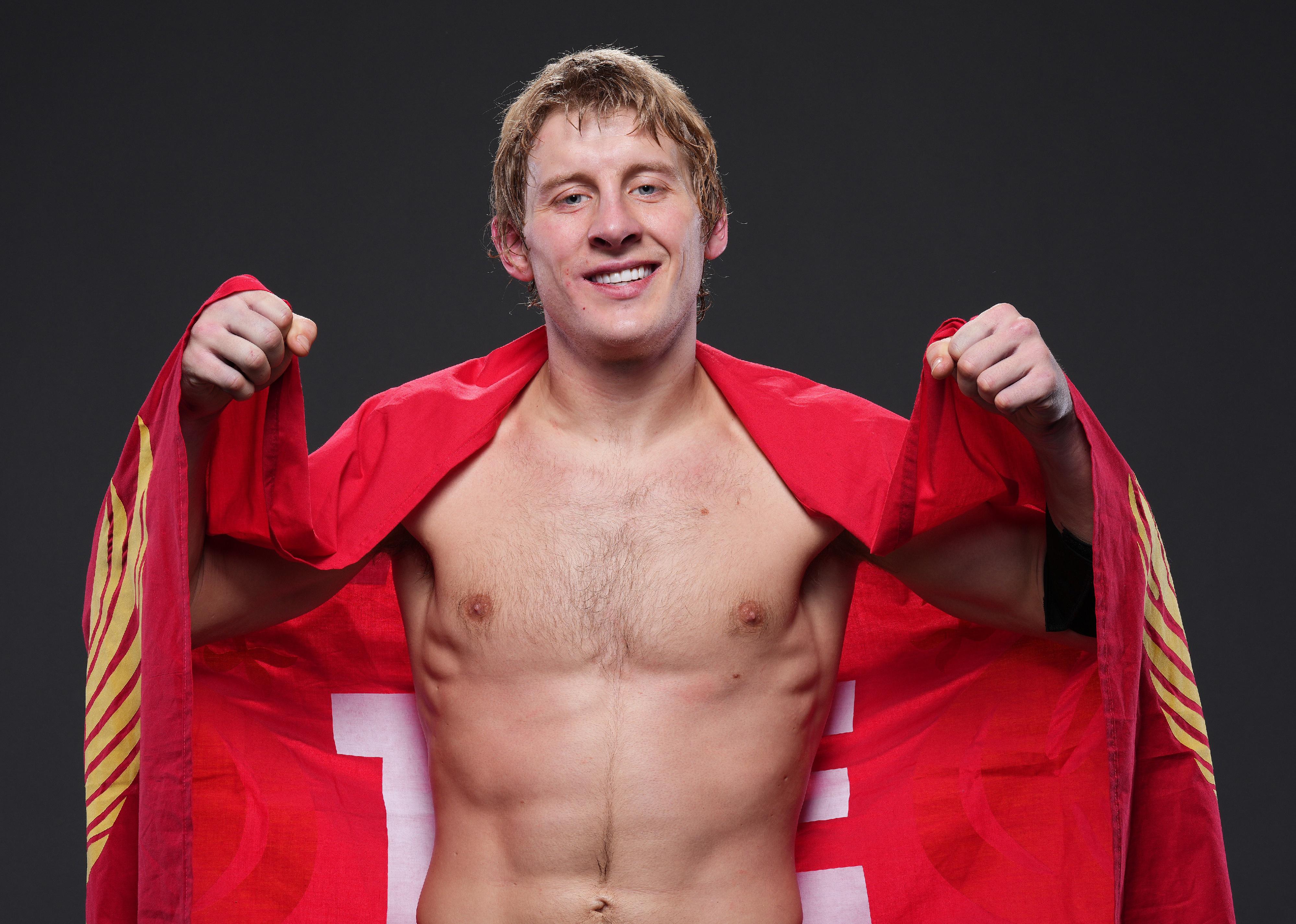 Paddy Pimblett poses for a post fight portrait backstage during the UFC 282 event.
