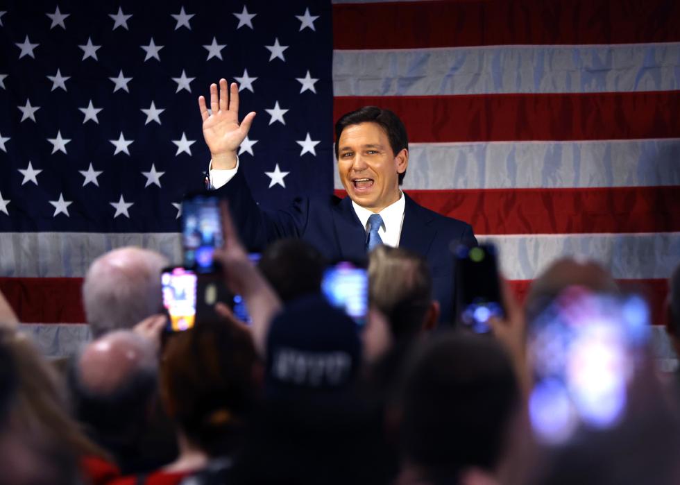 Ron DeSantis waves as he speaks to police officers about protecting law and order in the Staten Island.