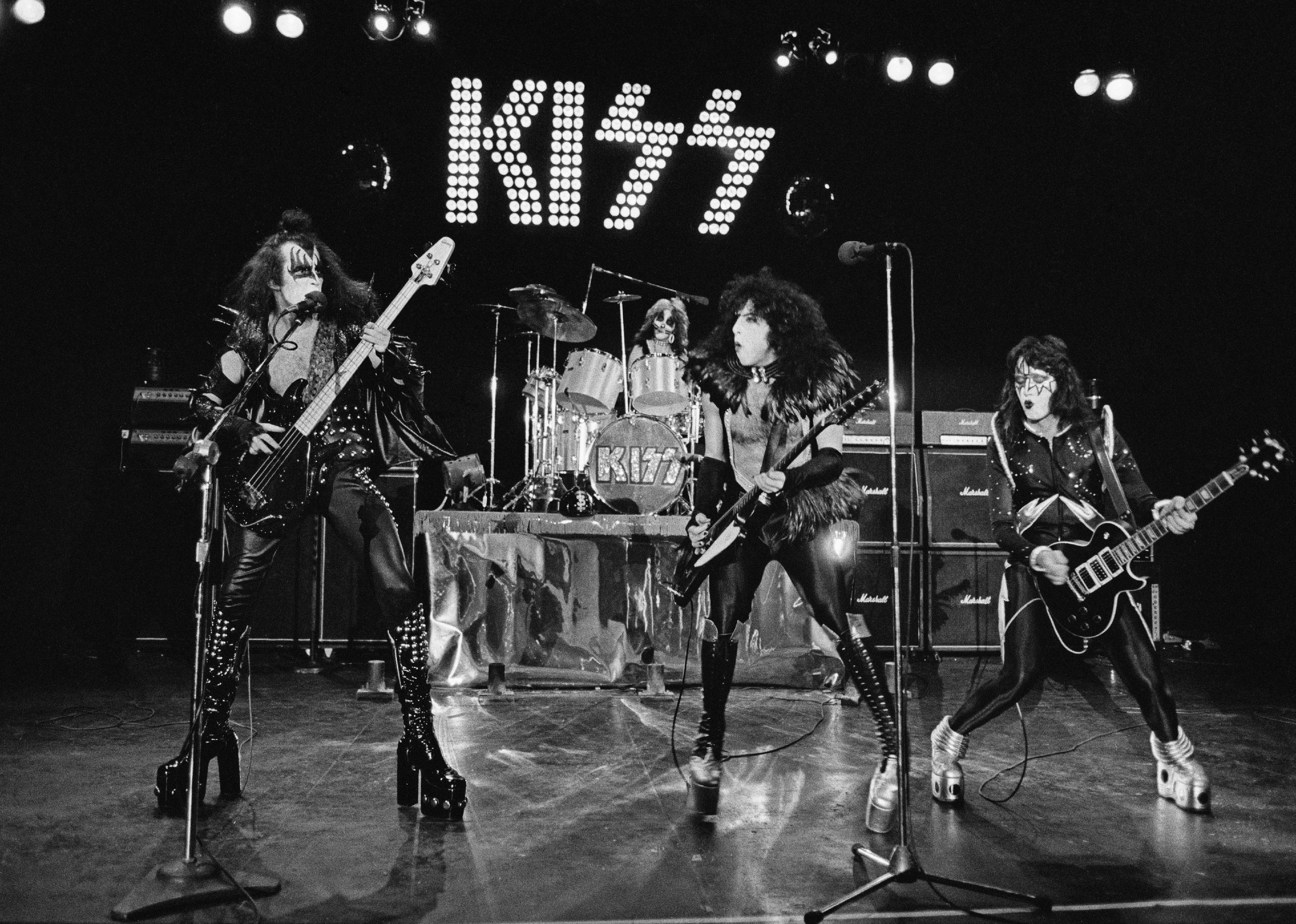 Kiss performs live on stage at Cobo Hall in Detroit.