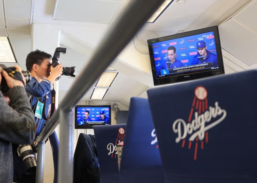 The Los Angeles Dodgers' Shohei Ohtani delivers a statement during a closed press conference.