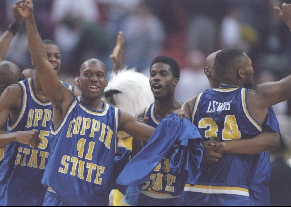 David Houston and Fred Warnick of the Coppin Eagles celebrate their win.
