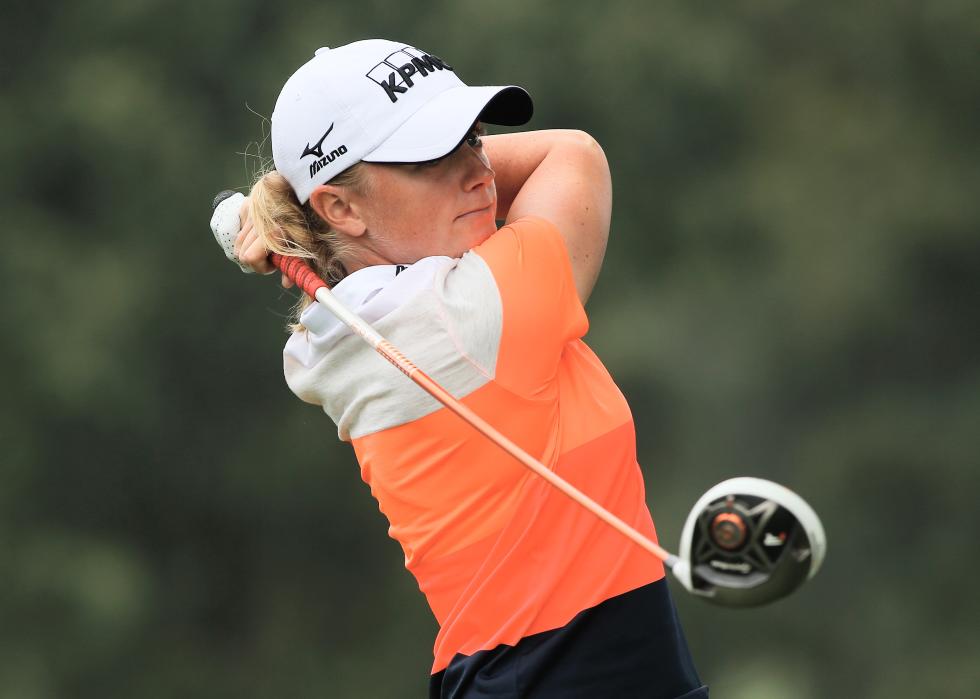 Stacy Lewis of the USA hits her tee shot on the third hole