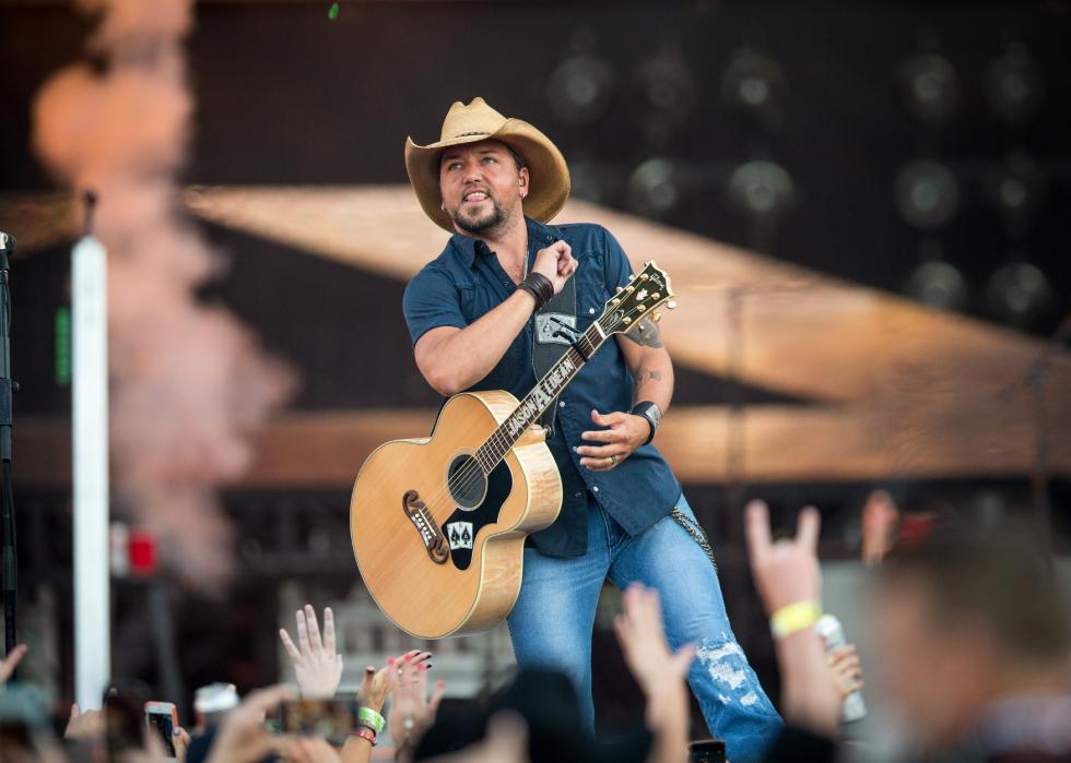 Jason Aldean performs during Kenny Chesney's The Big Revival Tour & Jason Aldean's Burn It Down 2015.