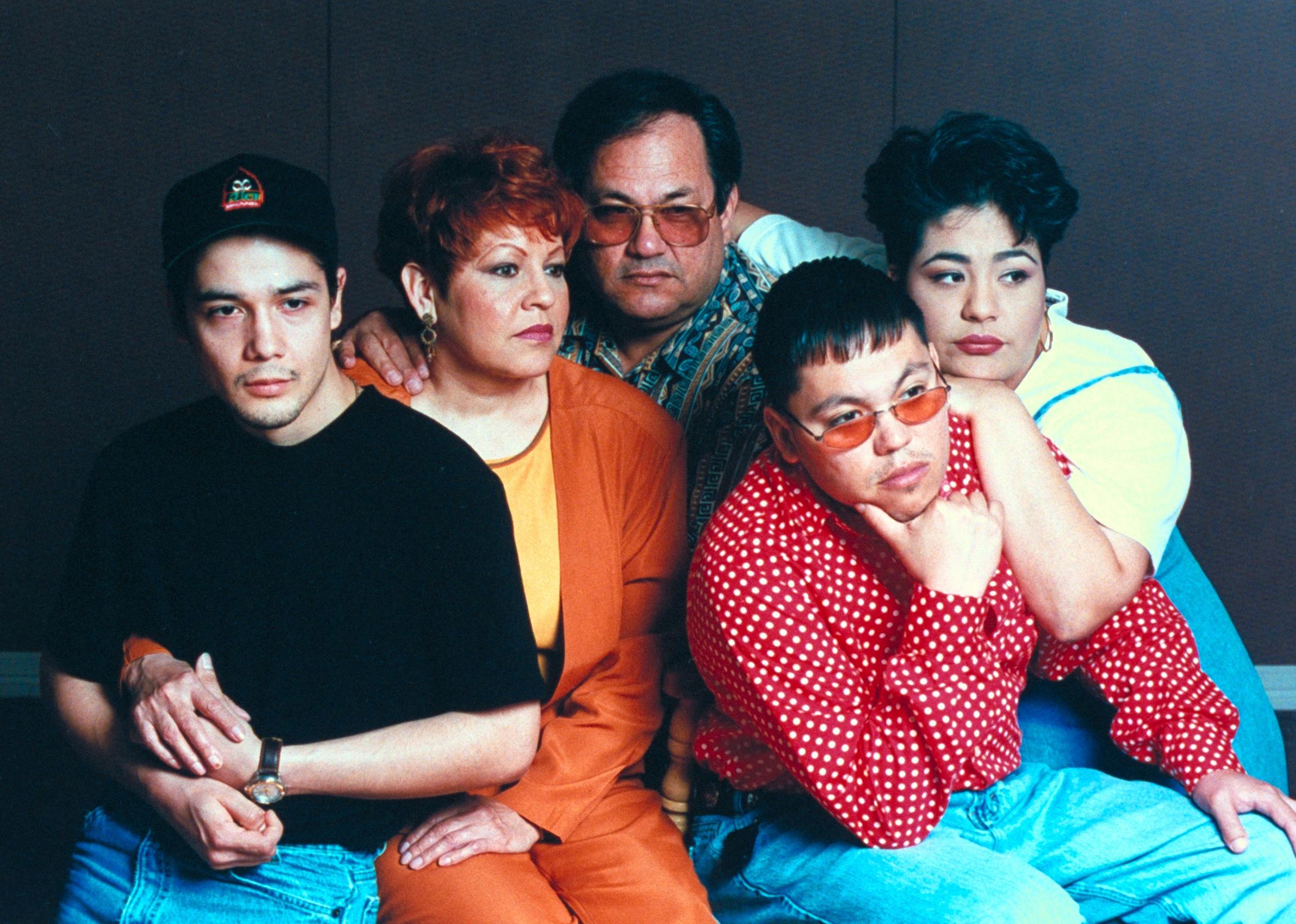  A portrait of Selena's family of Selena, including husband Chris Perez, parents Marcela and Abraham, and siblings A.B. and Suzette.