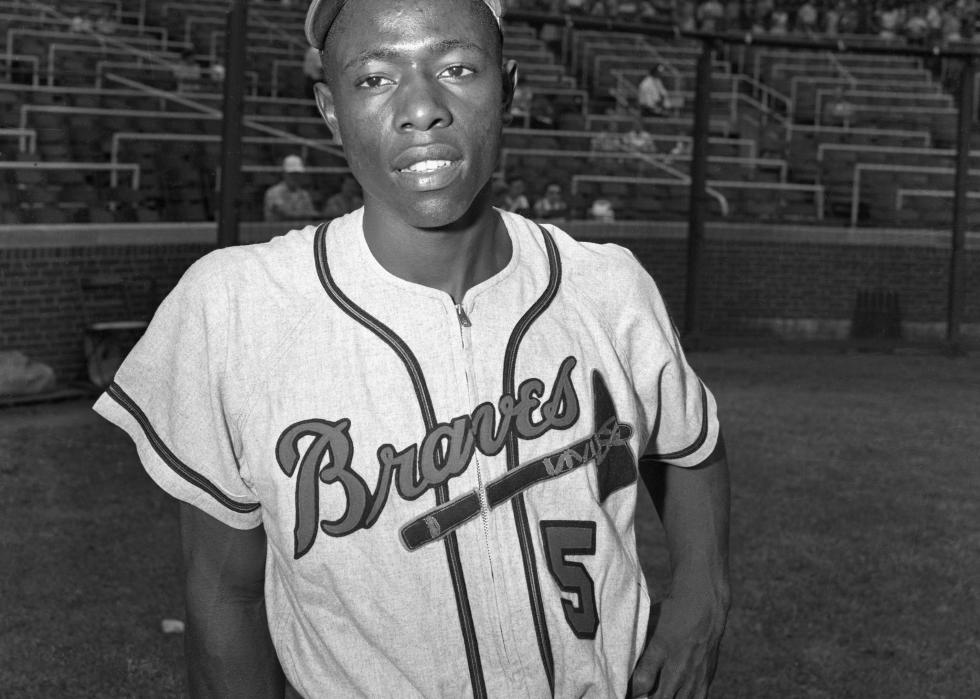 Hank Aaron poses in uniform