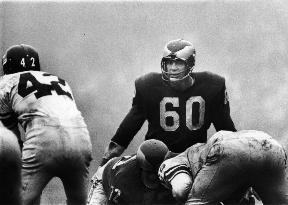 Chuck Bednarik of the Philadelphia Eagles eyes his opponants, late 1950s or early 1960