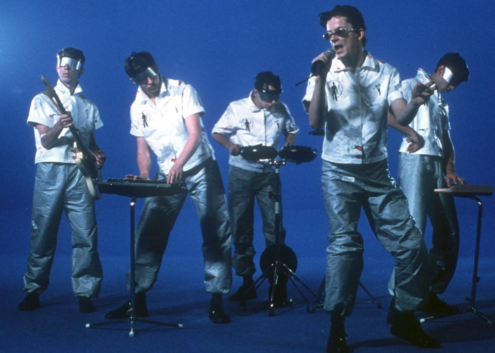 Alan Myers, Bob Mothersbaugh, Bob Casale, Mark Mothersbaugh and Gerald Casale of the group "Devo" pose for a portrait.
