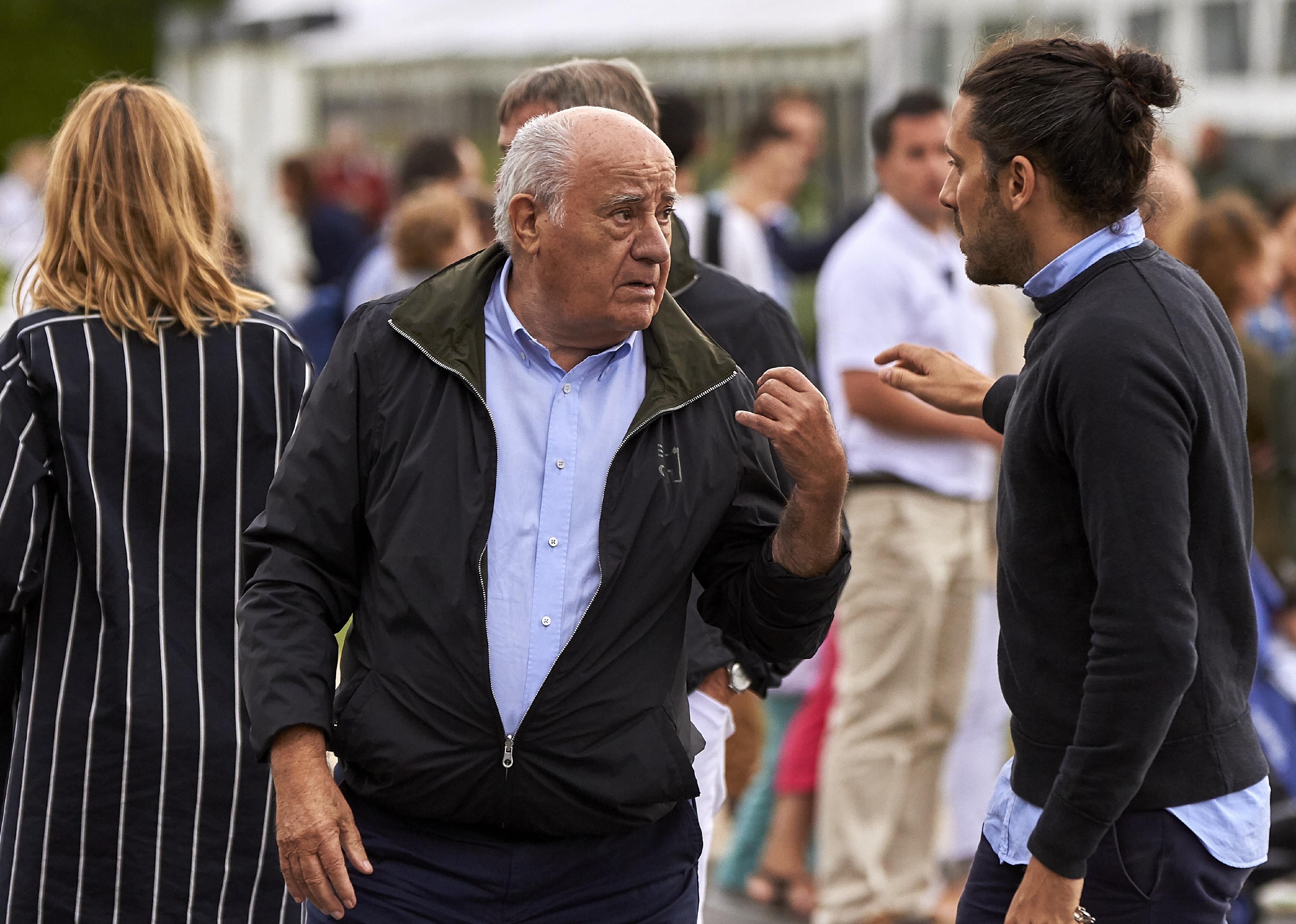 Amancio Ortega at sporting event.