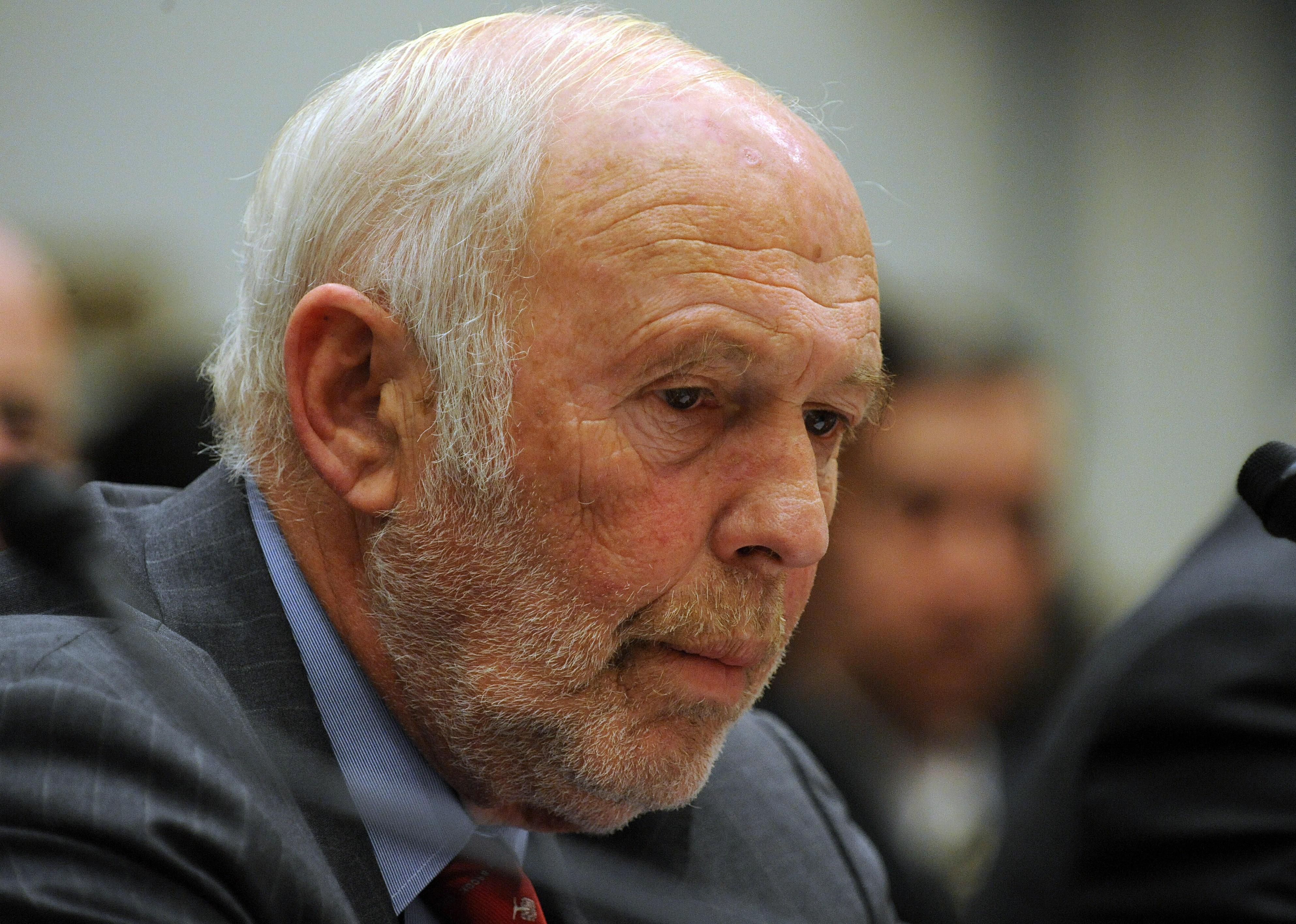 Jim Simons seated portrait.