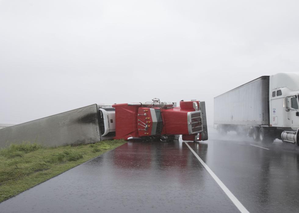 A big rig lies on it's side on Hwy 59 near Edna, Texas