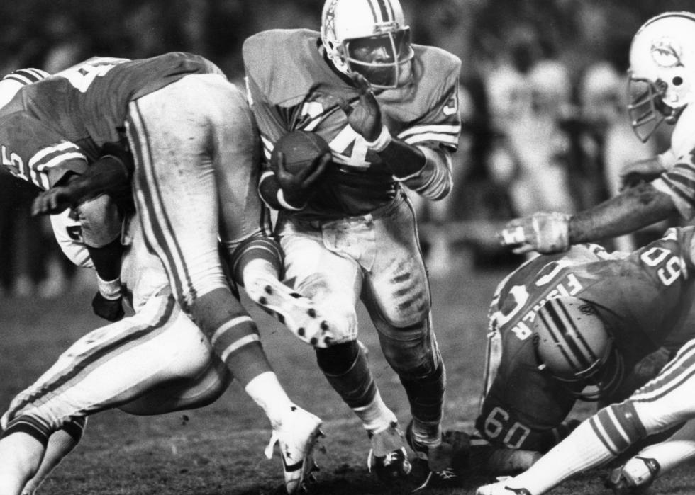Earl Campbell finds a big hole during the AFC Wildcard Playoff
