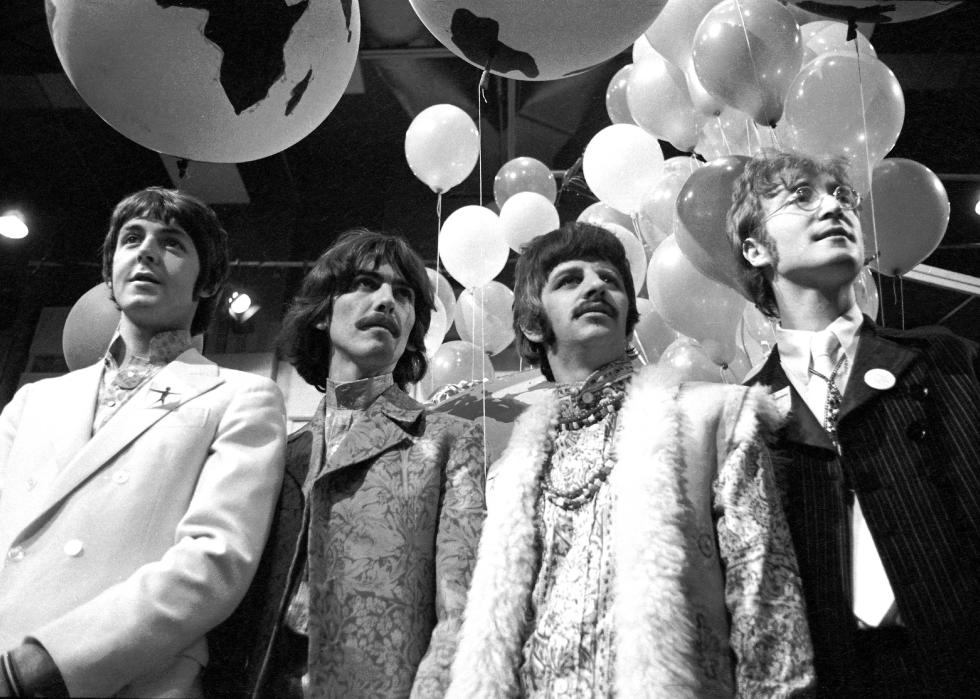 The Beatles pose together during a press call at Abbey Road Studio.