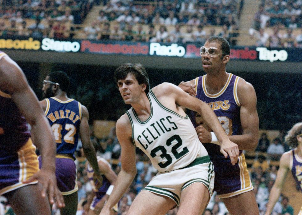 Kevin McHale, left, blocks Los Angeles Lakers Kareem Abdul-Jabbar.