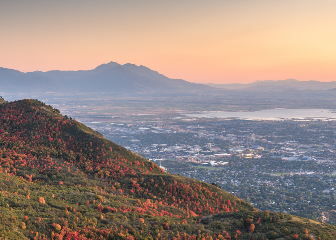 The city of Provo, Utah in a low valley surrounded by mountains.