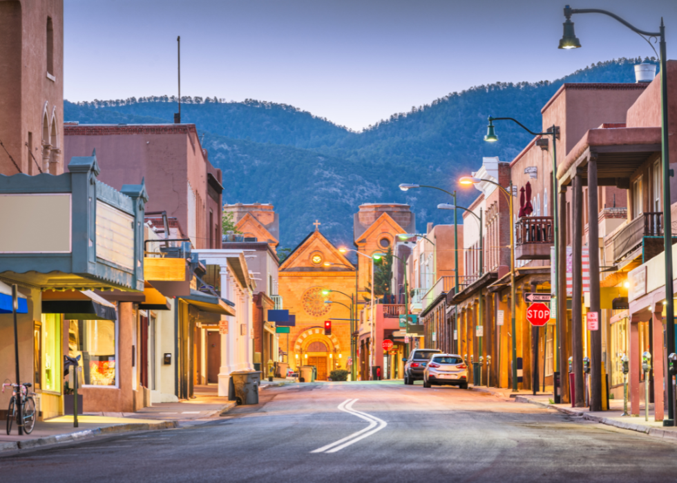 A quiet street in Santa Fe, New Mexico at dusk.
