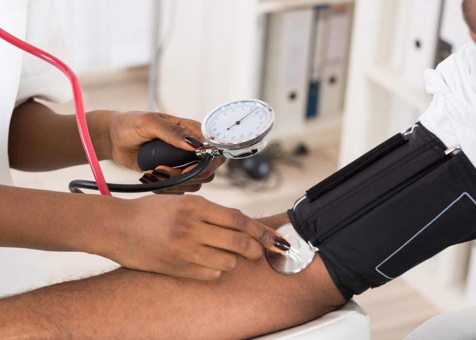 Patient having blood pressure checked.