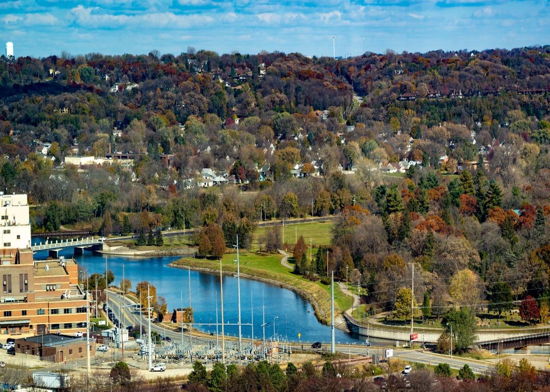 An aerial view of Rochester, Minnesota, homes on the hillside by the water.
