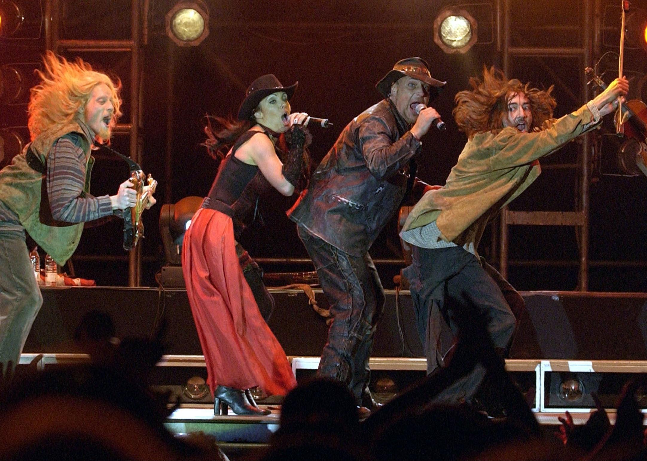 Rednex performing onstage.