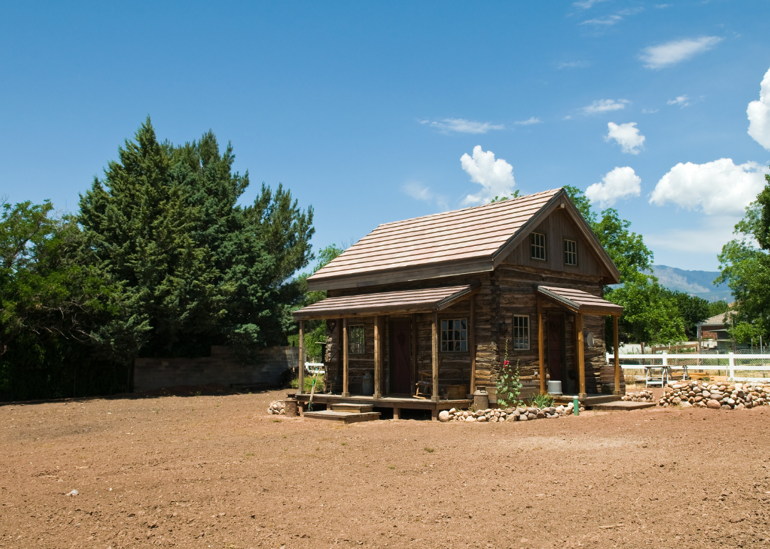 A small old log house.