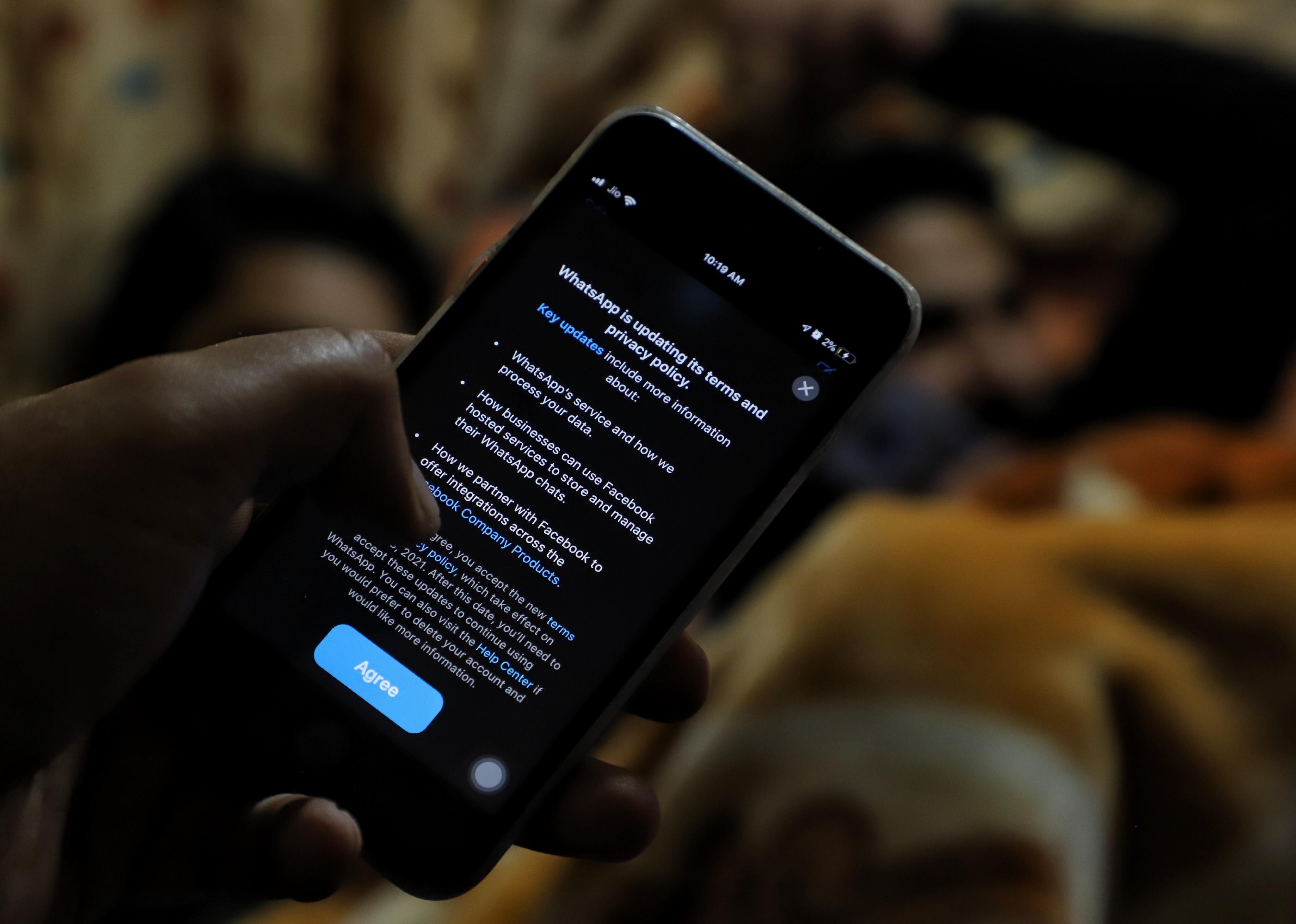 A dark phone with a privacy policy agreement pulled up.