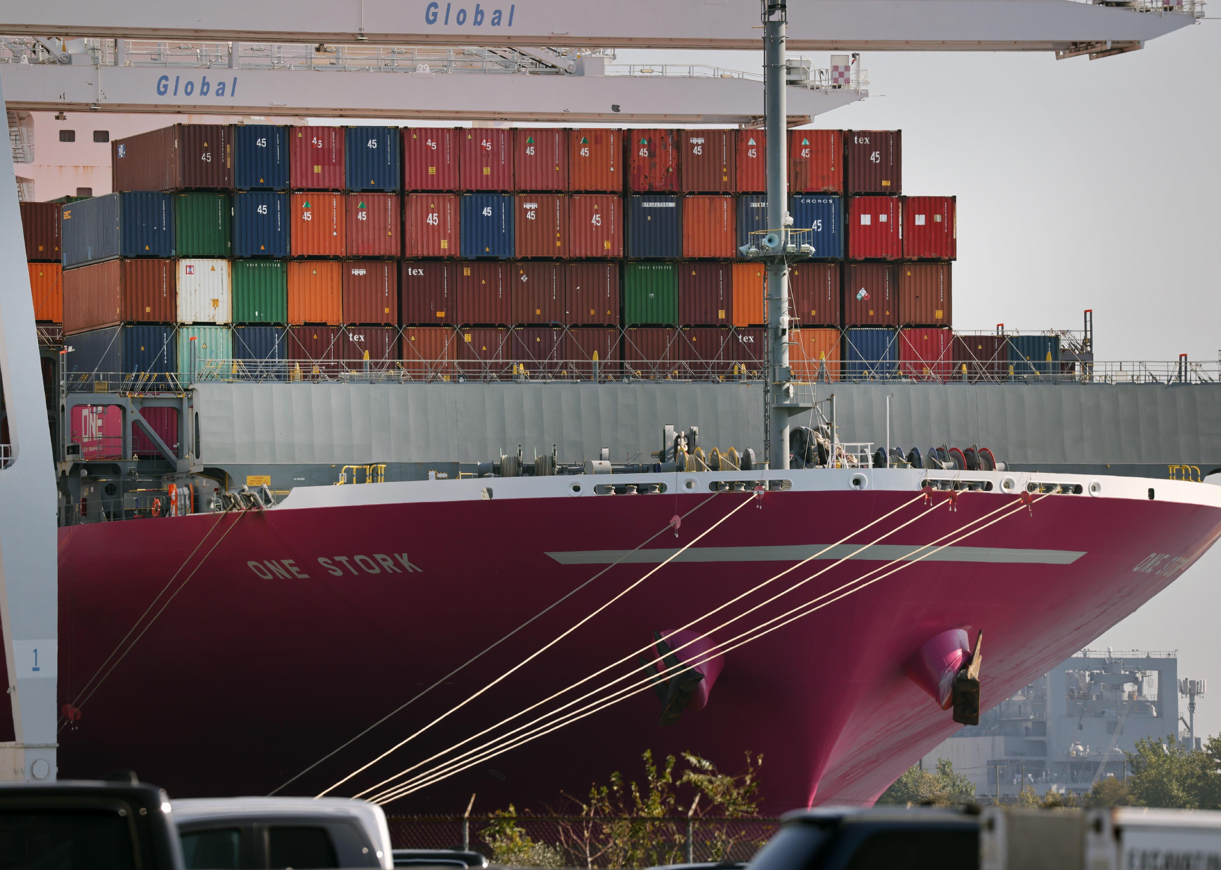 A docked ship full of containers.